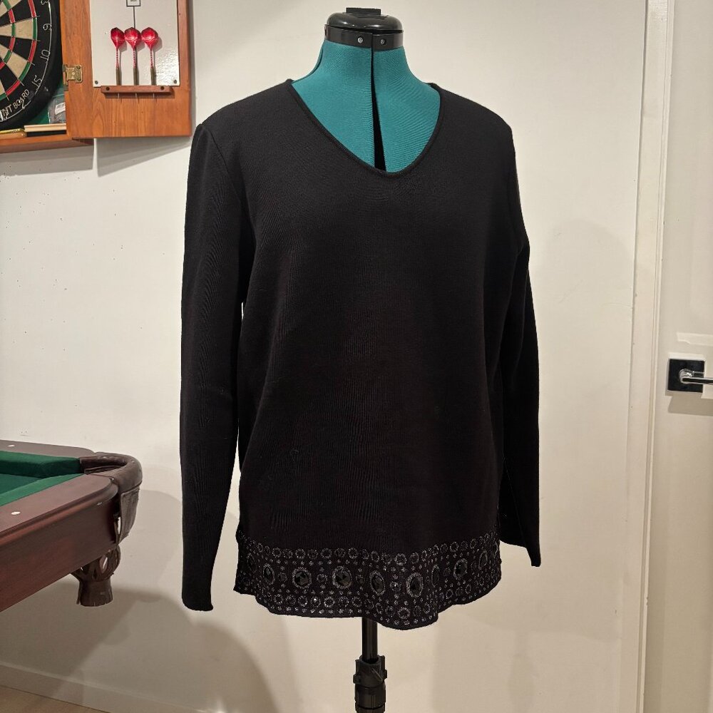 Elegant black sweater with matching maxi scarf